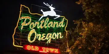 Old Town Portland, Oregon sign representing The Cooperative Canine Portland dog training and pet sitting service area